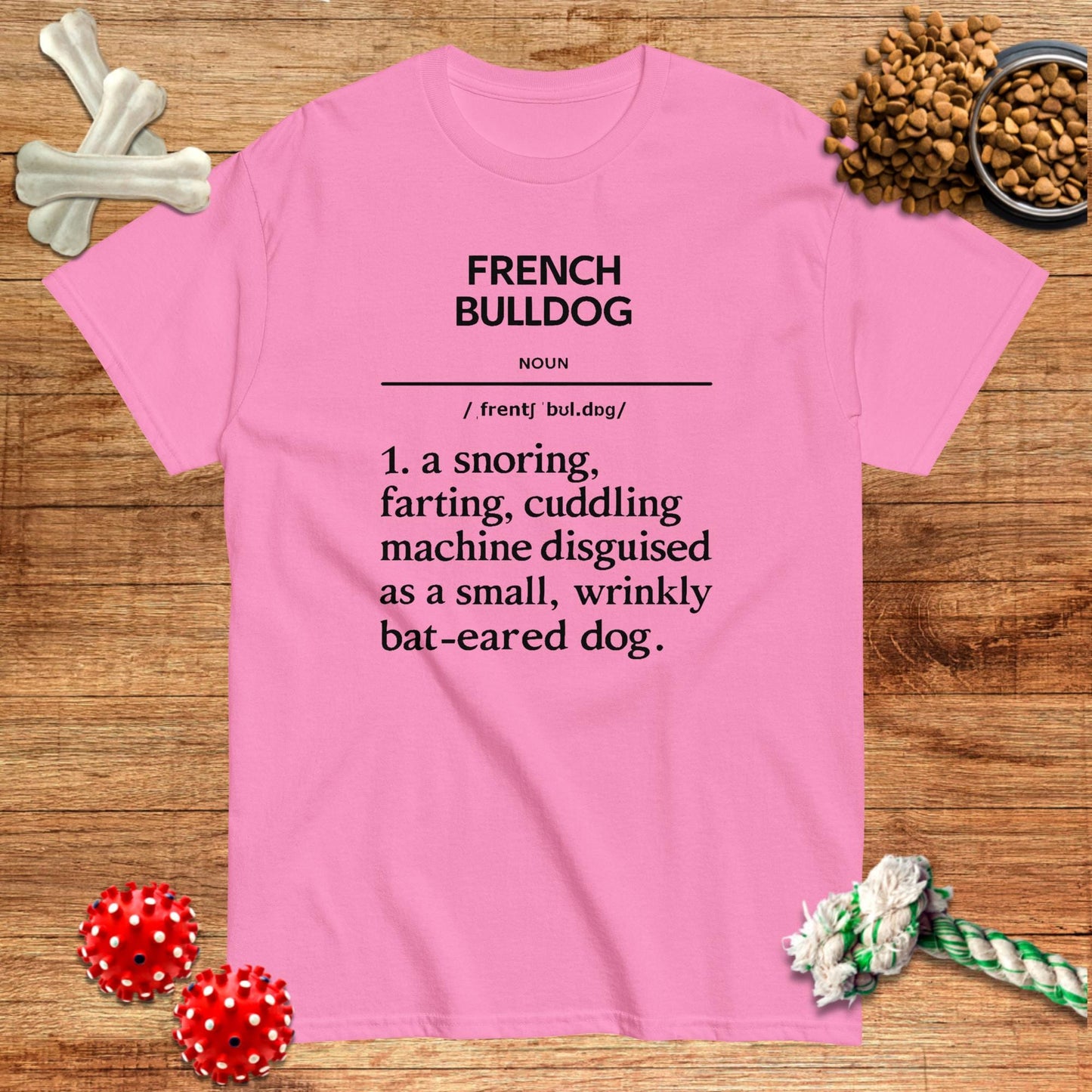 Black t-shirt featuring a humorous definition of "French Bulldog" by Pawsome Frenchie Designs.