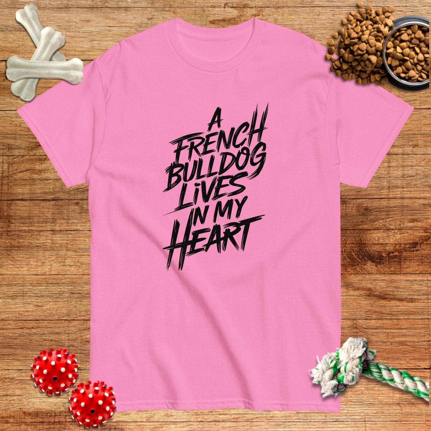 Pink t-shirt with "A French Bulldog Lives in My Heart" graphic, perfect for dog lovers by Pawsome Frenchie Designs.
