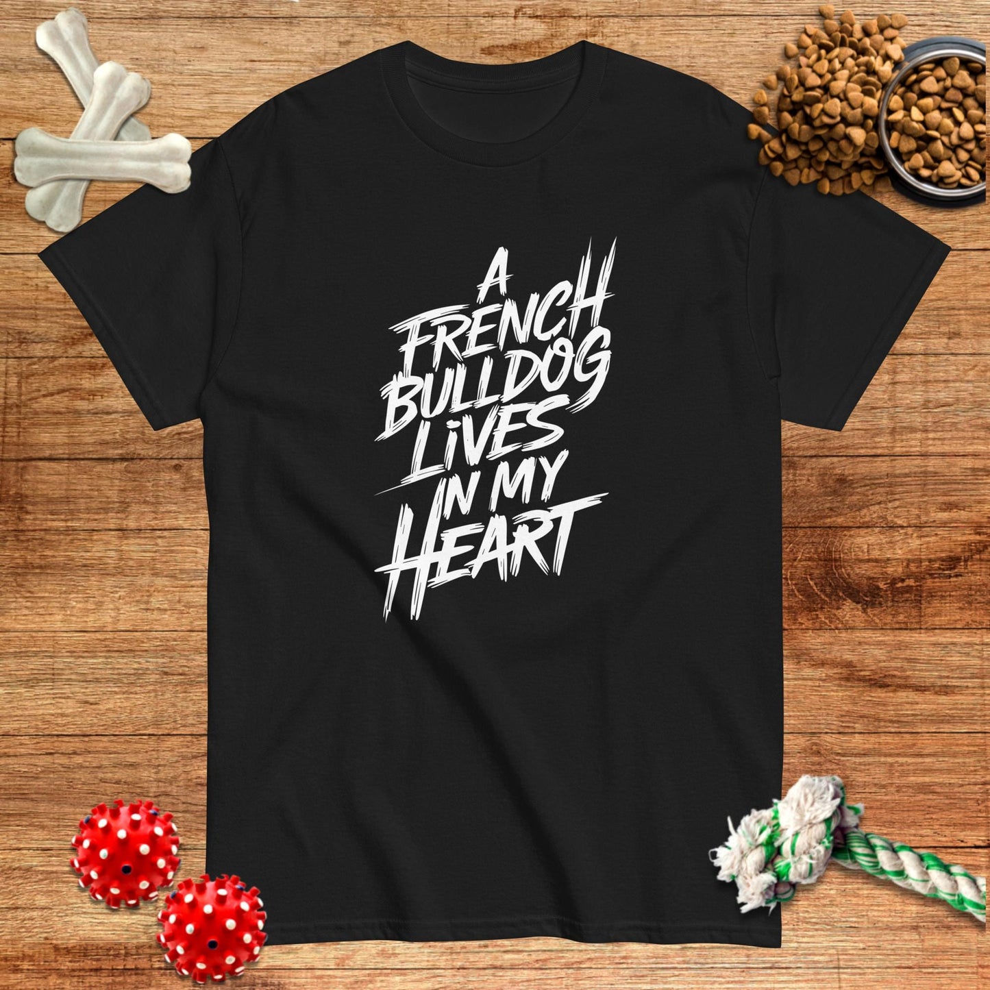 Black t-shirt featuring "A French Bulldog Lives in My Heart" text, designed by Pawsome Frenchie Designs.