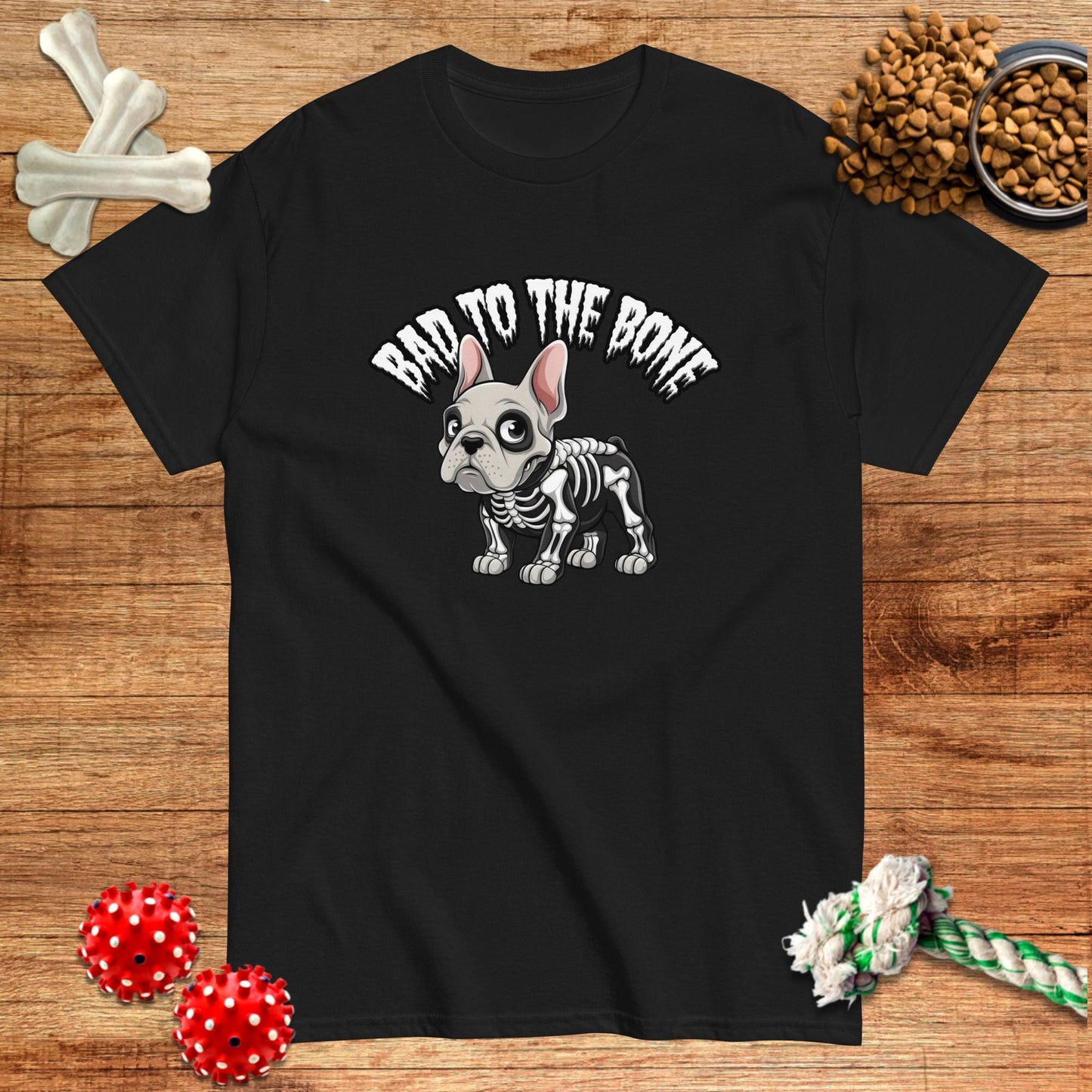 Black Halloween t-shirt featuring a skeleton French Bulldog design, "Bad to the Bone" text, by Pawsome Frenchie Designs.