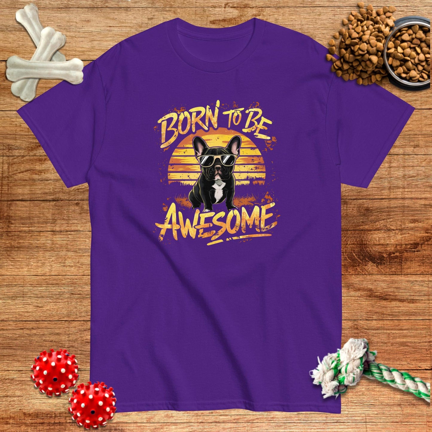 Purple cotton t-shirt featuring a French Bulldog graphic with "Born To Be Awesome" text, by Pawsome Frenchie Designs.