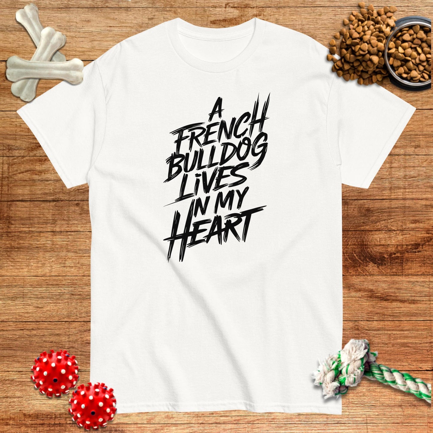 White t-shirt with "A French Bulldog Lives in My Heart" graphic, perfect for dog lovers.